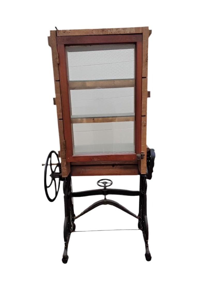 Antique Beste Deutsche Linen Press Mangel Machine: Antique Beste Deutsche Linen Press Mangel Machine This 19th century machine is made of wood and ornate black cast iron. The three-level glass shelf is visible from a central glass frame also encase