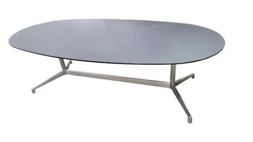 MCM Eames Black Glass and Chrome Table: Materials: METALMid Century Modern Eames Executive Series Black Glass Racetrack Top Segmented Chrome Base 8 FT Conference/Dining TableExquisite mid century modern Eames Oval Black Glass Top with Knife
