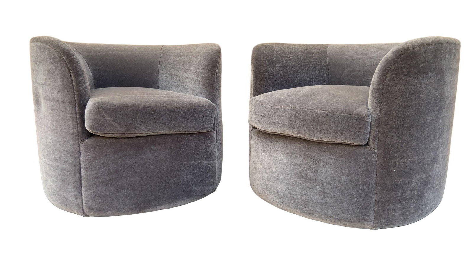 MCM Faudet-Harrison Swivel Lounge Chairs Newly Reupholstered - Pair: Materials: MOHAIRMid Century Modern Faudet-Harrison Designed Continuous Swivel Tub Lounges for SCP England Newly Reupholstered in a “Smoked-Ash ”Italian Mohair - PairExquiste Pair of