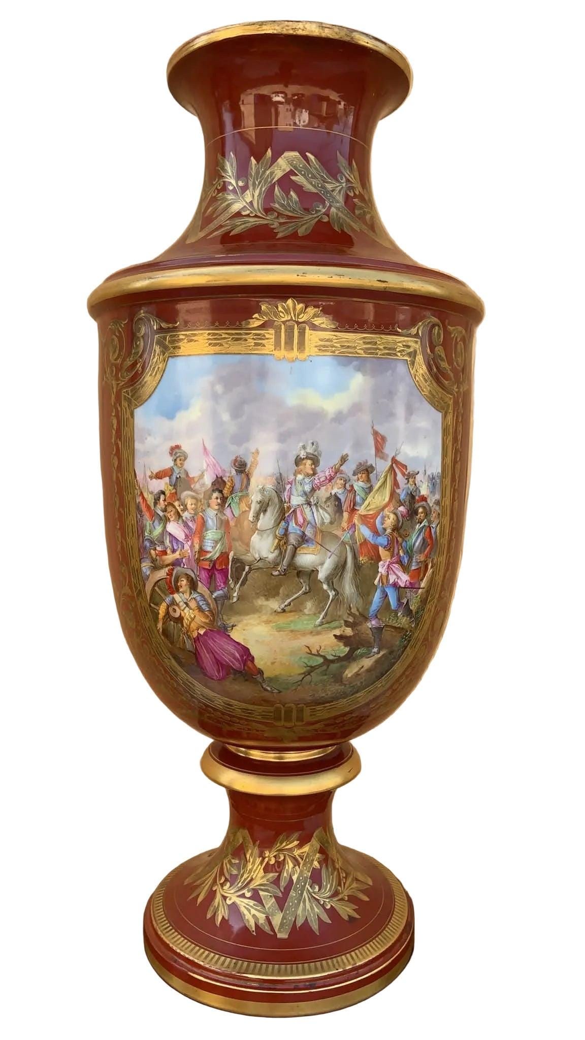 Antique Oversized French Sevres Porcelain Trumpet Vase: Late 19th Century Large Red French Sevres Painted Porcelain Trumpet VaseThis amazing Sevres Porcelain Vase in red exudes an opulent and striking presence. The vase is crafted from fine porcelain, and