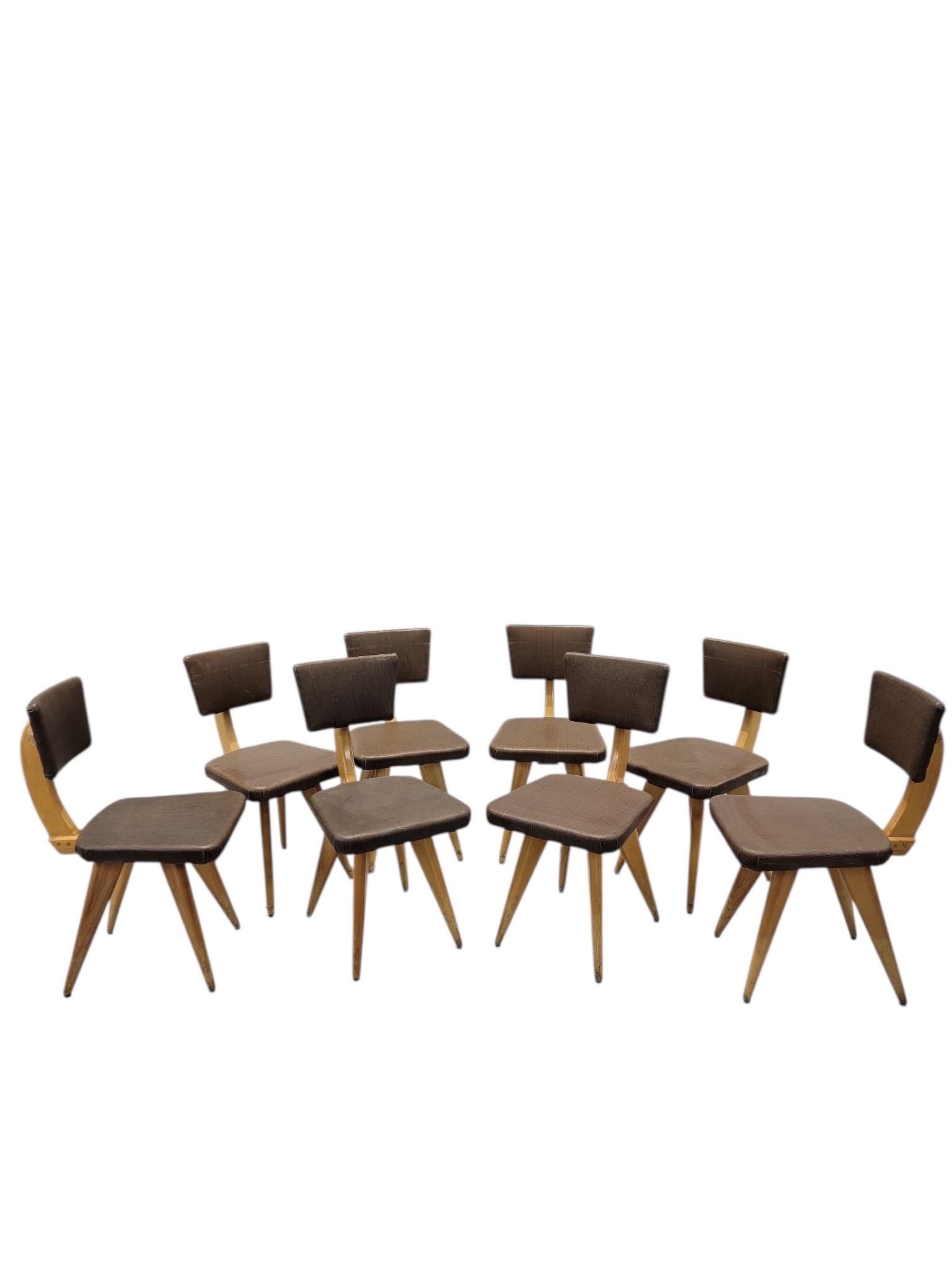 MCM Italian Style Sculptural Dining Chairs – 8: Materials: Vinyl, woodMid Century Modern Italian Style Sculptural Dining Chairs – Set of 8Sculptural Mid-Century Modern dining chairs in the Italian style, circa 1950s–1960s. Featuring ele