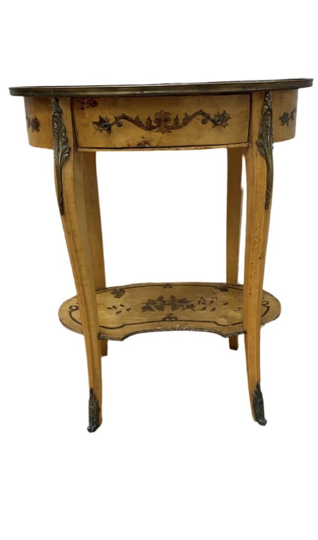 Vintage Italian Two Tier Inlaid Side Table: Materials: woodWidth: 24 inchesHeight: 28.5 inchesDepth: 15 inchesVintage Italian Two Tier Inlaid Side TableThis Vintage Italian Inlaid Side Table features a sophisticated two-tier design, providing