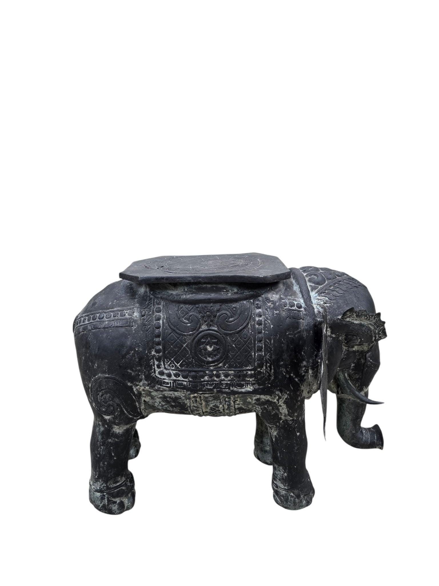 Antique Balinese Hammered Bronze Saddled Elephant Side Table: Antique Balinese Finely Detailed Patina Hammered Bronze Saddled Elephant Plant-Stand/Cocktail TableEach sculpture features a finely detailed head-dress and saddle. Made from hammered bronze, these scu