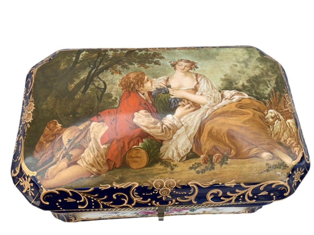 Antique French Sèvres Style Painted Porcelain Box: Antique French Sèvres Style Painted Porcelain and Gilt Brass BoxThis antique Jewelry box is crafted in the style of Sevres, France circa 1870s. The porcelain bombe casket has cobalt blue and gilt