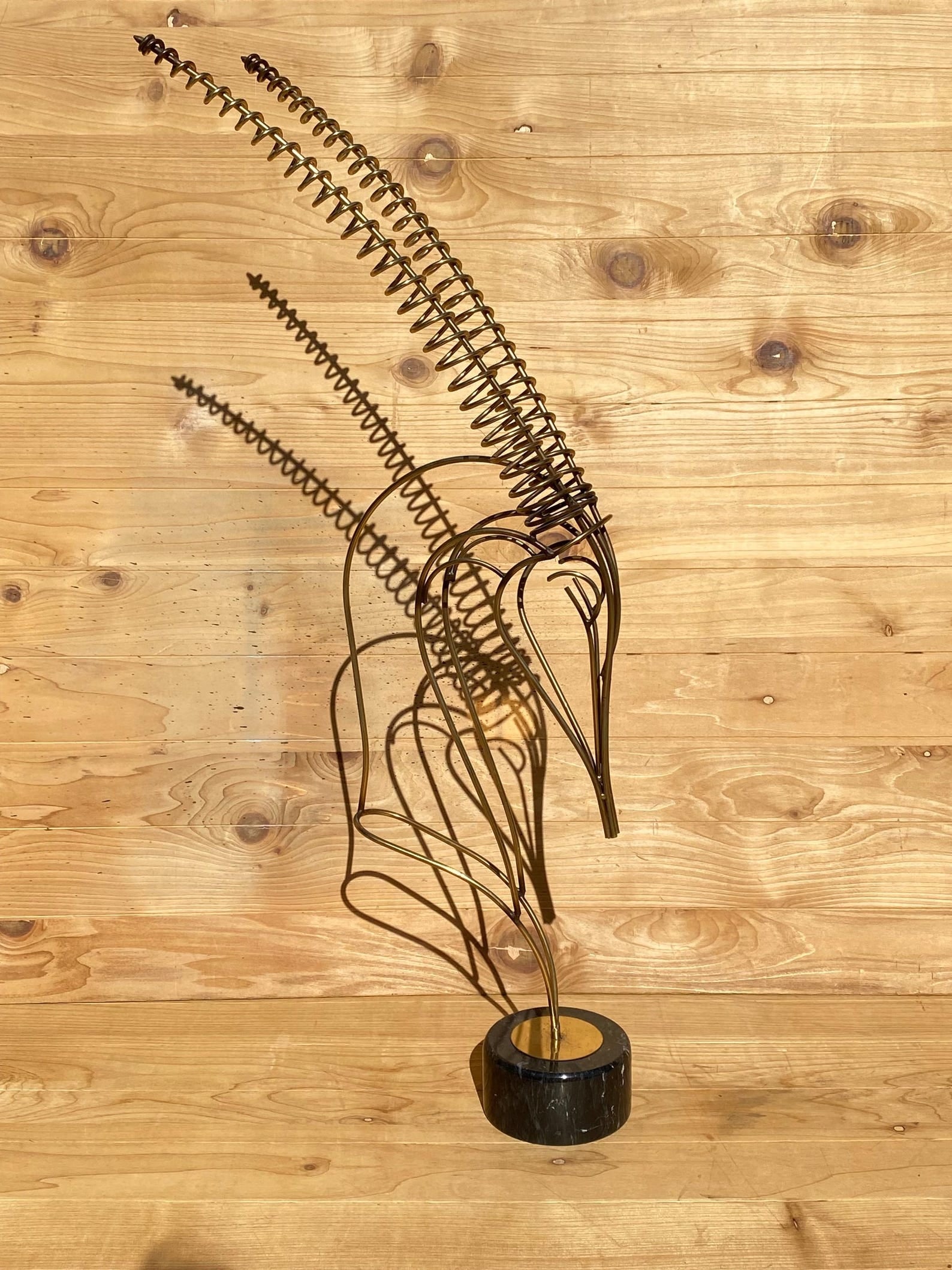 MCM Curtis Jere Brass Gazelle Sculpture: Mid Century Modern Curtis Jere Brass Gazelle SculptureDecorate your office with a Mid Century Modern Curtis Jere brass wire bust of a gazelle with corkscrew antlers. The statue sits on a circular remo
