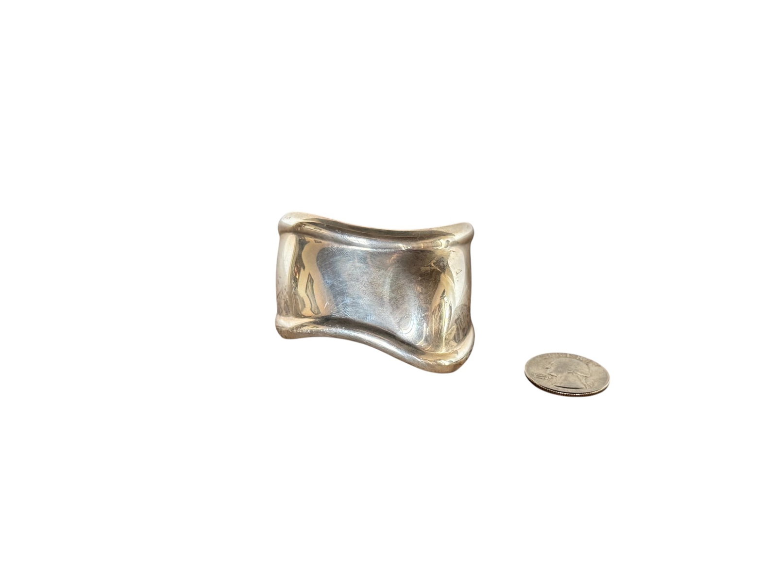 Elsa Peretti for Tiffany & Co. Sterling Silver Left Cuff Bracelet: Vintage Bone cuff designed by Elsa Peretti (1940-2021) for Tiffany & Co.This sculptural cuff is one of the most iconic designs created by Elsa Peretti for Tiffany & Co. and from the 20th century