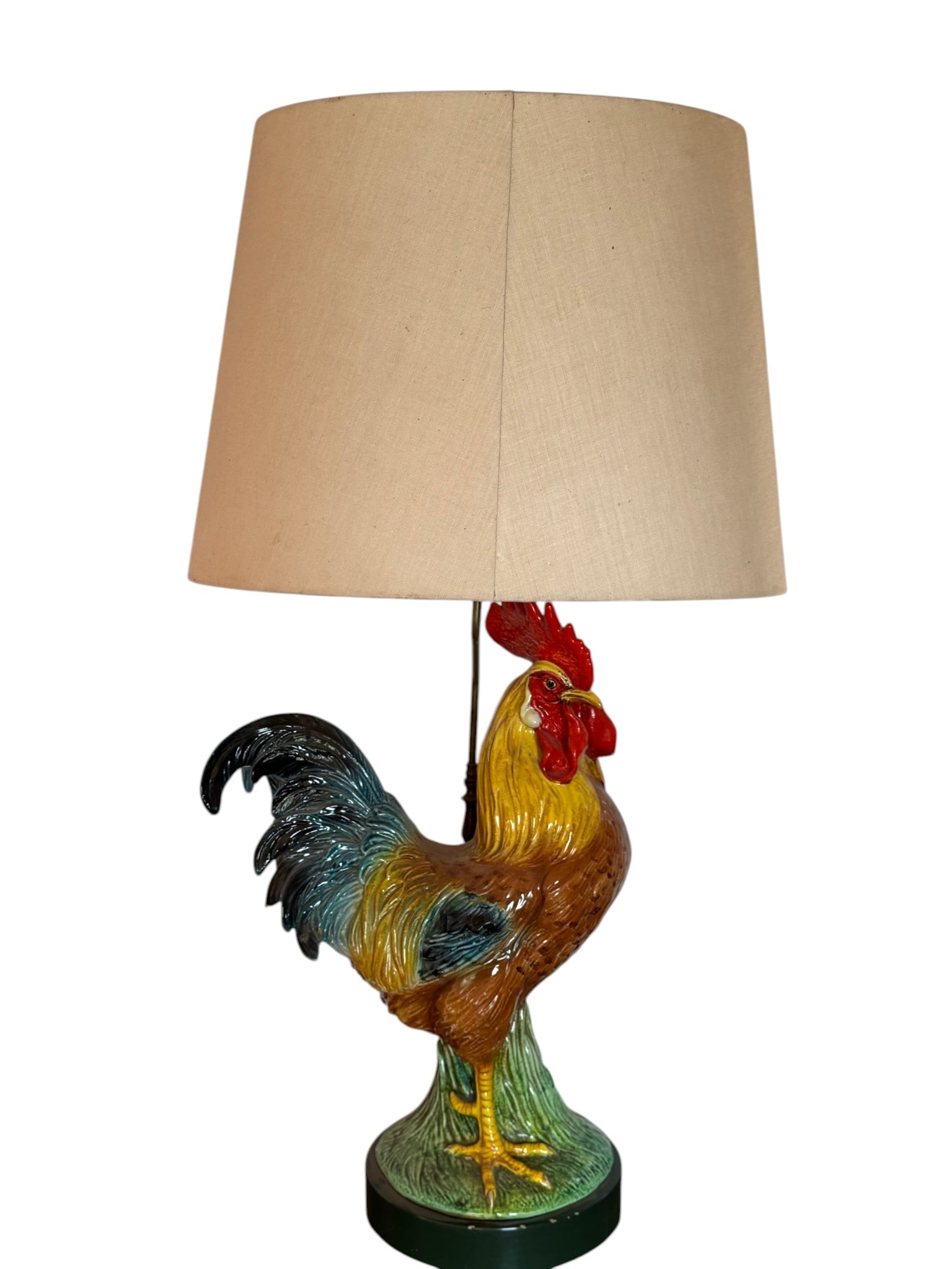 Vintage Ceramic Rooster Table Lamp: A charming vintage ceramic table lamp, likely from the mid-20th century, molded in the form of a colorful rooster. The rooster features hand-painted details with a vibrant red comb and wattle, a