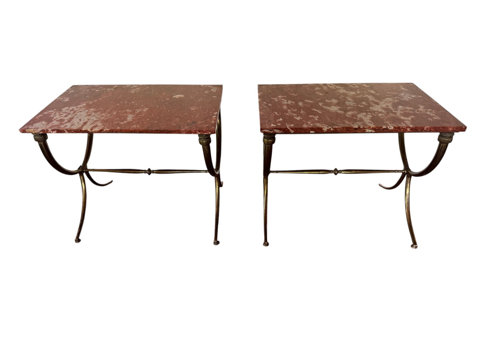 Pair of 20th Century Italian Neoclassical Gilt Bronze Mounted Rouge Marble Console Tables: Pair of Italian Neoclassical style console tables, dating from the early to mid-20th century. Each table features a rectangular top crafted from polished rouge marble, showcasing rich reddish-brown hu
