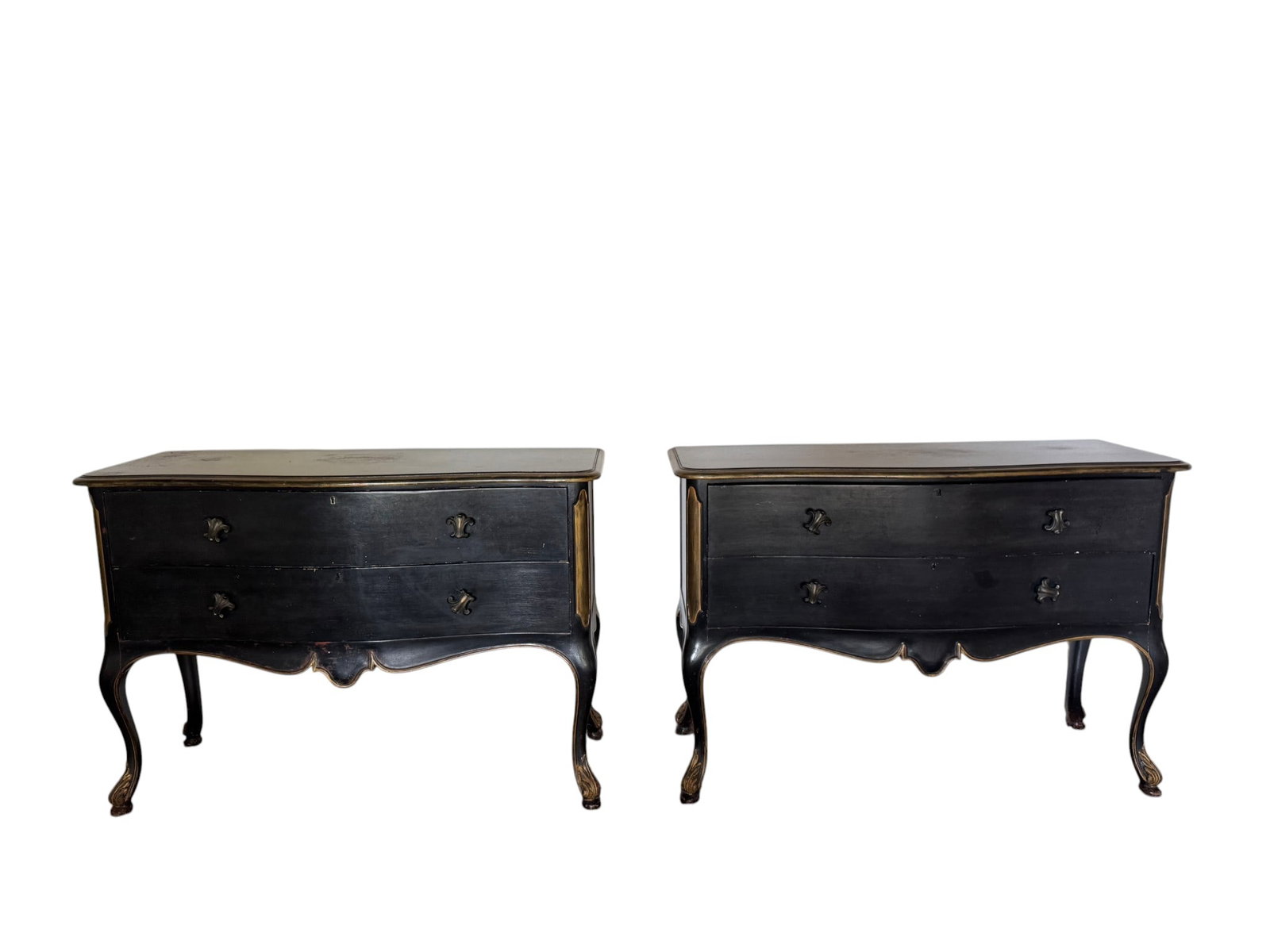 Pair of Louis XV Style Black Lacquer and Gilt Bronze Nightstands/Commodes: This is a pair of elegant Louis XV style nightstands or commodes, featuring a black lacquered finish with exquisite gilt bronze accents. Each commode is fitted with two drawers, adorned with