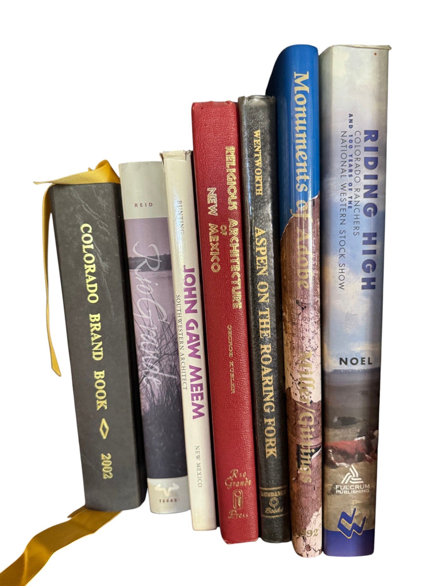 Collection of 7 Books on Colorado and New Mexico History, Architecture, and Ranching: A collection of seven books focused on the history, architecture, and culture of Colorado and New Mexico. Titles include "Riding High: Colorado Ranchers and 100 Years of the National Western Stock