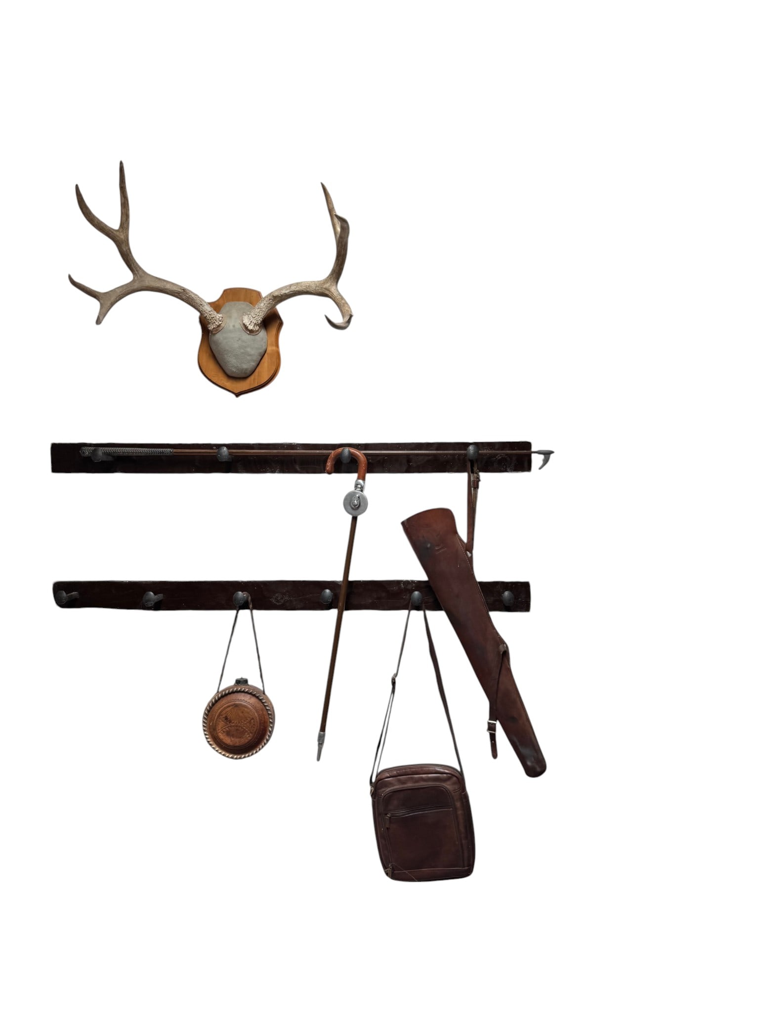 Collection of Hunting and Equestrian Accoutrements: A collection of vintage sporting accessories, likely from the early to mid-20th century, comprising a deer antler mount, a leather rifle scabbard/case, a leather ammunition or cartridge shoulder bag,