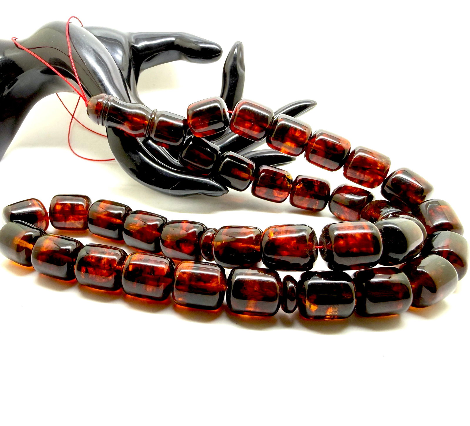 Unique and Splendid Amber Tesbih made from Barrel shaped Amber beads: Title:Unique and Splendid Amber Tesbih made from Barrel shaped Amber beads Metal:None Gemstone:Amber Weight:68.0 g Size:Bead size: 15.0 x 13.0 mm Made of:(Reconstituted Amber or Whole