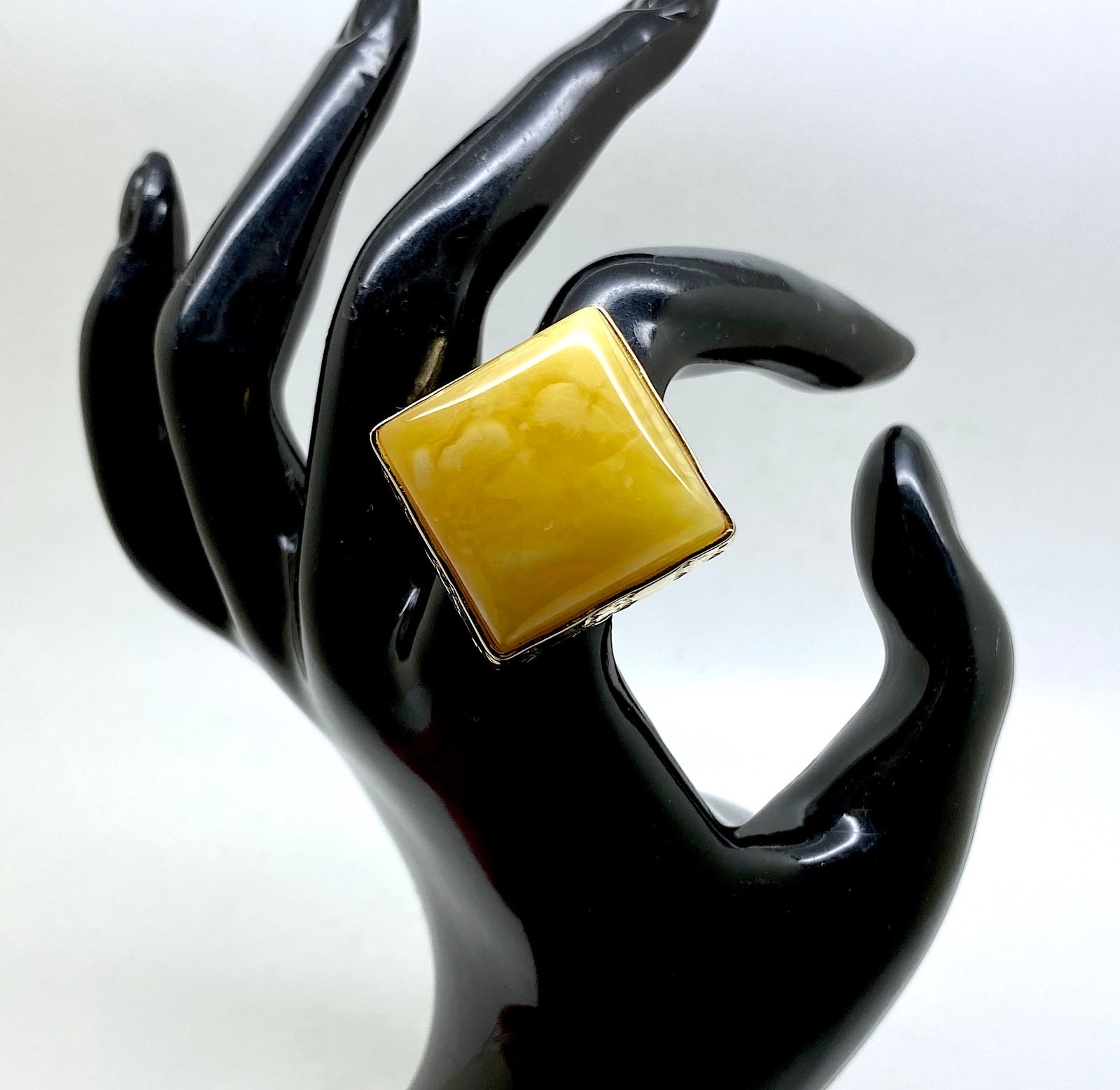 Adjustable Square Amber Ring: Title:Adjustable Square Amber Ring Metal:Argentum 925 gold plated Gemstone:Amber Weight:15.0 g Size:Inner diameter: 18.0 x 18.0 mm Size: 32.0 x 32.0 x 33.0 mm Size: 1.26 x 1.26 x 1.299 inches Inner di