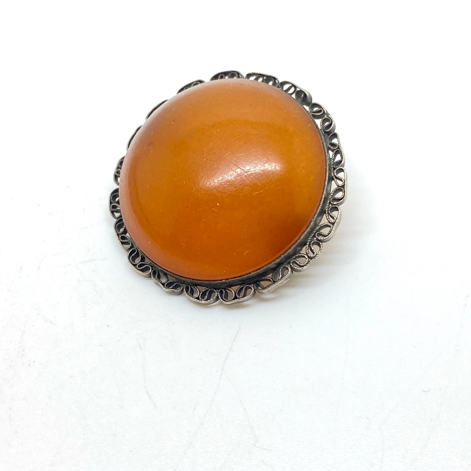 Outstanding Amber Brooch: Title:Outstanding Amber Brooch Metal:Silver 875 Gemstone:Amber Weight:8.6 g Size:Size: 35.0 x 35.0 x 9.1 mm Size: 1.378 x 1.378 x 0.358 inches Made of:(Reconstituted Amber or Whole Stone):Reconstitute