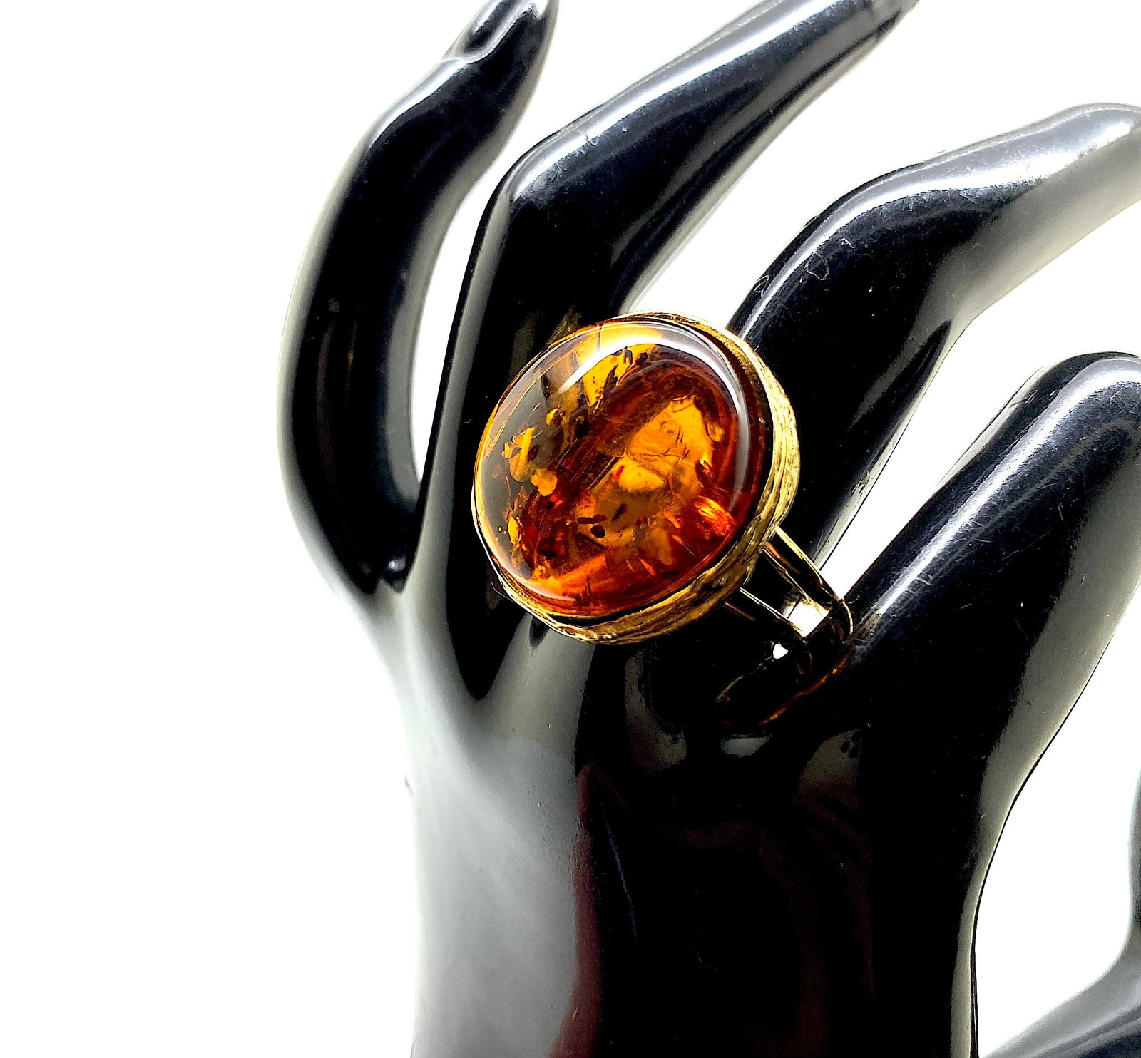 Adjustable Amber Ring: Title:Adjustable Amber Ring Metal:925 Silver-Gold Plated Gemstone:Amber Weight:10.33 g Size:Inner diameter: 17.25 mm Size: 22.0 x 22.0 x 30.0 mm Size: 0.866 x 0.866 x 1.181 inches Inner diameter: