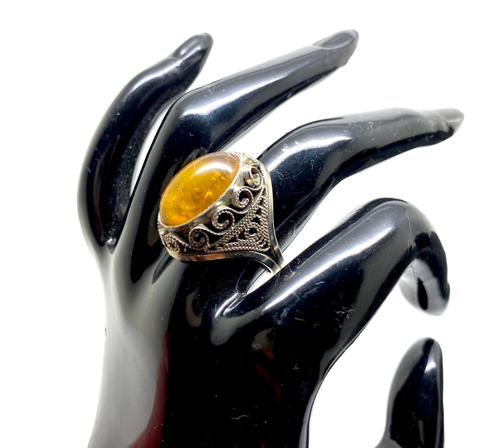 Marvellous Vintage Amber Ring: Title:Marvellous Vintage Amber Ring Metal:Iron Alloy Gemstone:Amber Weight:5.5 g Size:Inner diameter: 17.0 mm Size: 23.0 x 20.0 x 28.0 mm Size: 0.906 x 0.787 x 1.102 inches Inner diameter: 0.669 inche