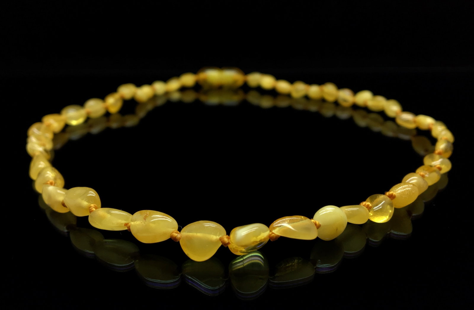 Unique and Grand Amber Necklace made from Hand Carved Amber beads: Title:Unique and Grand Amber Necklace made from Hand Carved Amber beads Metal:None Gemstone:Amber Weight:3.4 g Size:Bead size: 4.8 mm Bead size: 0.189 inches Made of:(Reconstituted Amber or Whole