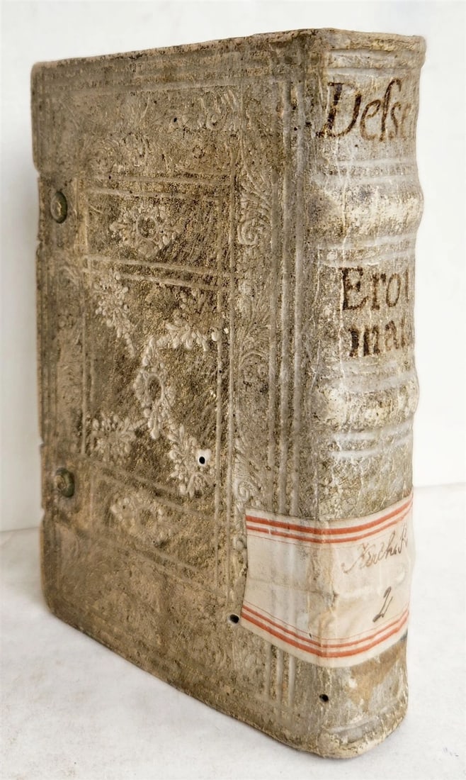 1697 CANON LAW BOOK Erotemata juris canonici. antique by V. ANDREAS: RAEVARDUS, J. Variorum, sive de iuris ambiguitatibus libri quinque. Bruges: H. Goltzius; (2 Dec.) 1564 333, (3) pp. With woodcut printer's mark on title page & 3 small numismatic text-woodcuts. Recent