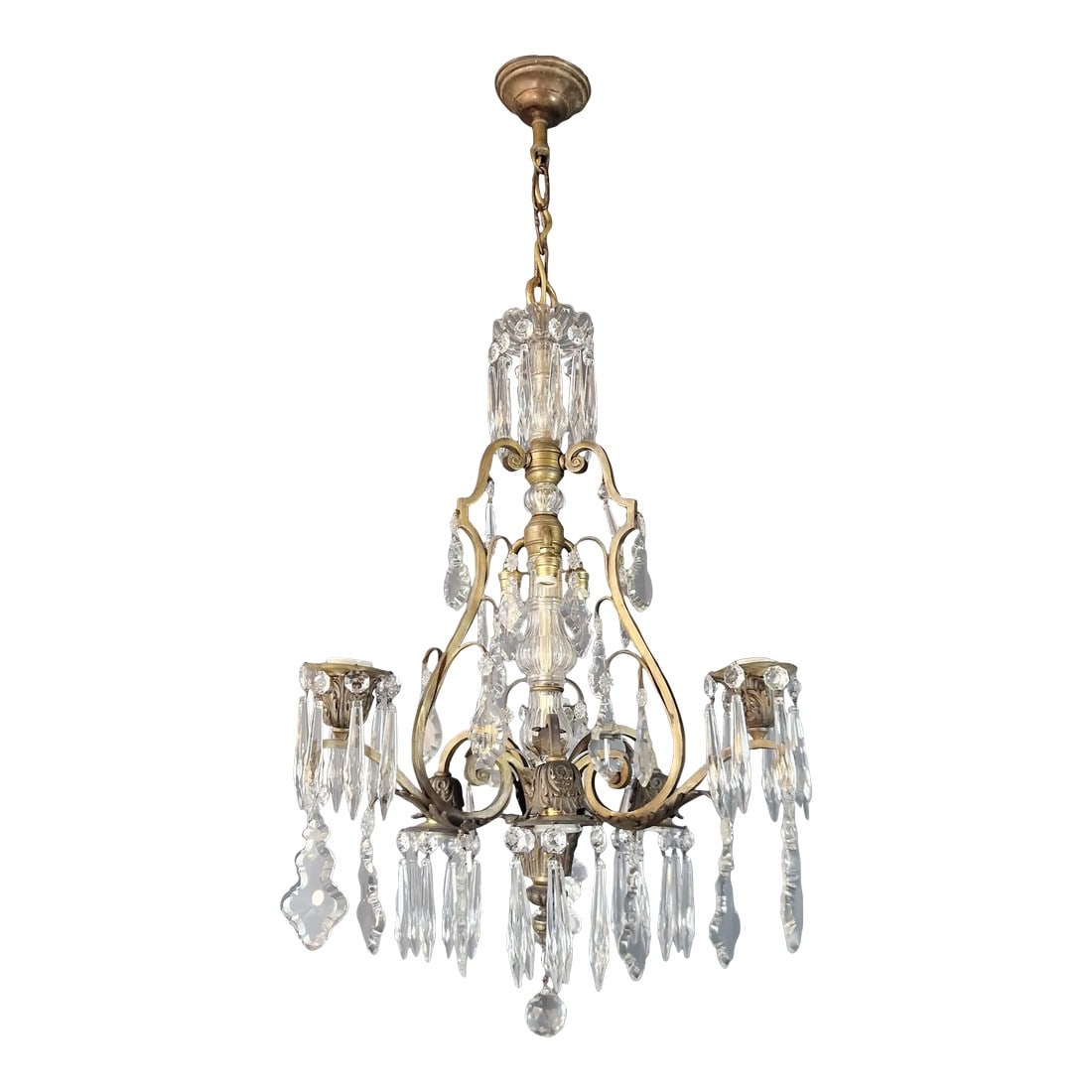 1930s Art Nouveau Art Deco Brass Crystal Chandelier: Introducing our Exquisite Antik Chandelier – a masterpiece of elegance and style that seamlessly complements any space with a touch of timeless beauty. With its stunning details and compact dime