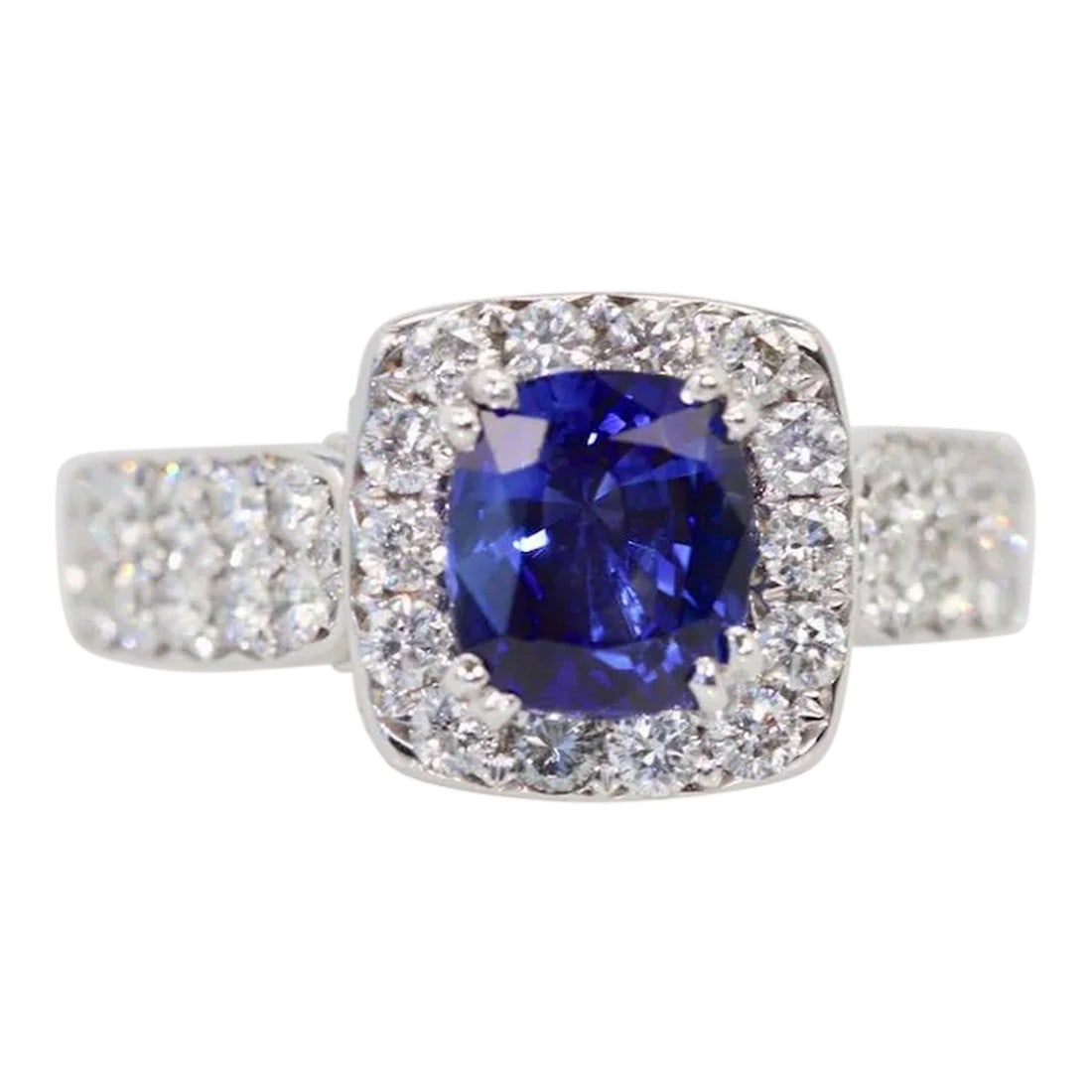 Burma Sapphire 18k Ring With Diamond Surround Size 6.5: This is part of Chairish's Fine Jewelry assortment. Burma Sapphire Ring with Diamond Surround 18k Everybody loves a nice Blue Sapphire ring. This one is from Burma and the Sapphire is set with a