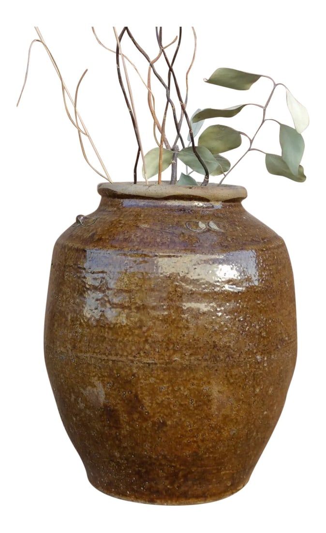 Antique Golden Brown Burmese Martaban Jar: A beautiful antique Southeast Asian pottery Martaban jar with a Henan style glaze and moulded ribbed details. **Please bear in mind that colors of products shown may vary slightly from their original 