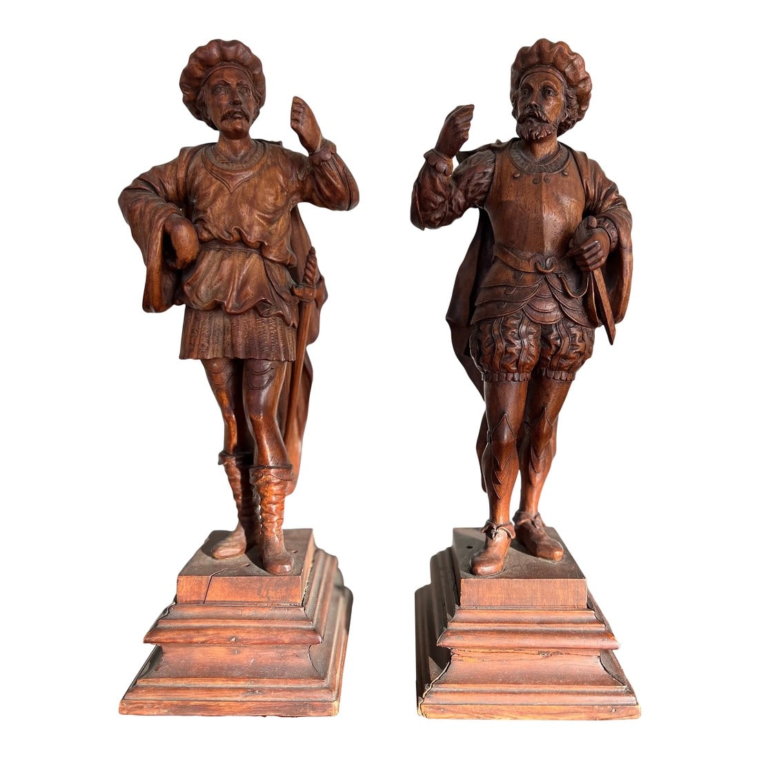 Pair, 19th Century Italian Renaissance Figural Spanish Soldiers or Landsknecht: Likely Italian, but possibly German origin - 19th century A pair of finely carved wood figures of Spanish Conquistadors or German Landsknecht. Each modeled in the Renaissance attire with detailed drap
