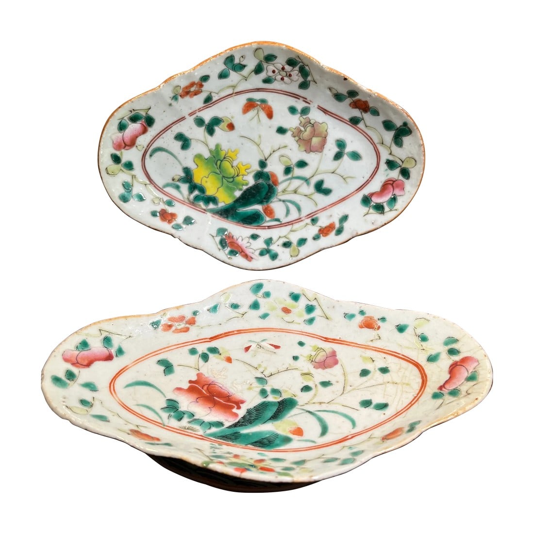 Set of 2 Chinese Famille Rose Lobed Pedestal Plates, Late 19th Century: Two Chinese export plates with beautiful hand painted detail. Colors of orange, yellow, pink, and green shine off the white background. I love the blue, orange, and black trim around the rim of pedest