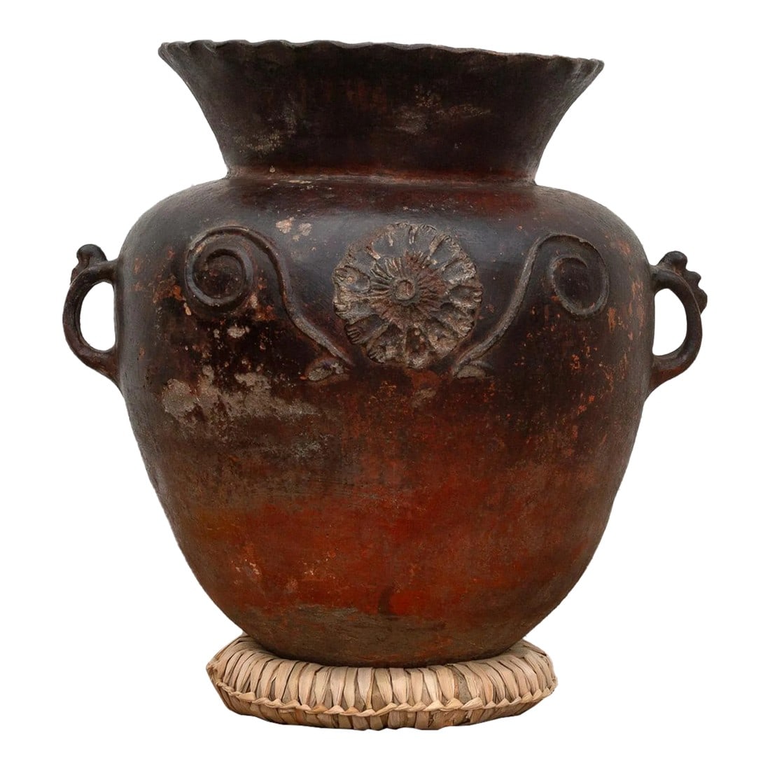 Antique Guatemalan Large Floral Olla: This large imposing pot, with its burnished earthen hues and substantial form, evokes the spirit of ancient Mayan pottery traditions. Imagine this vessel gracing a ceremonial site, its ample belly