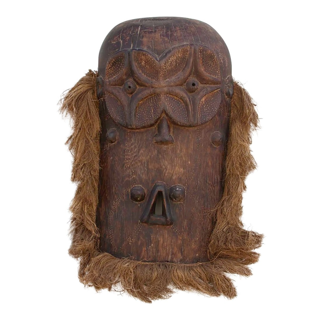 Large Original Senufo Ceremonial Mask: An original African carved mask originally featured in the tradition of Senufo masquerade performances which originated in West Africa. The use of raffia-fringed face masks, capes, and full-body outfi