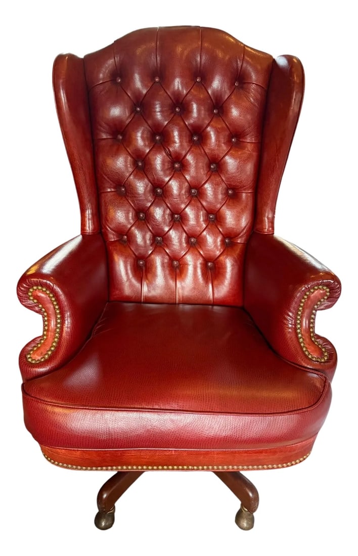 Late 20th Century Hancock & Moore Tufted Leather Executive Office Chair: Quick Hits: Iconic Hancock & Moore craftsmanship Rich deep wine leather with deep button tufting Nailhead trim and rolled arms for classic sophistication Swivel base with caster wheels for mobility Id