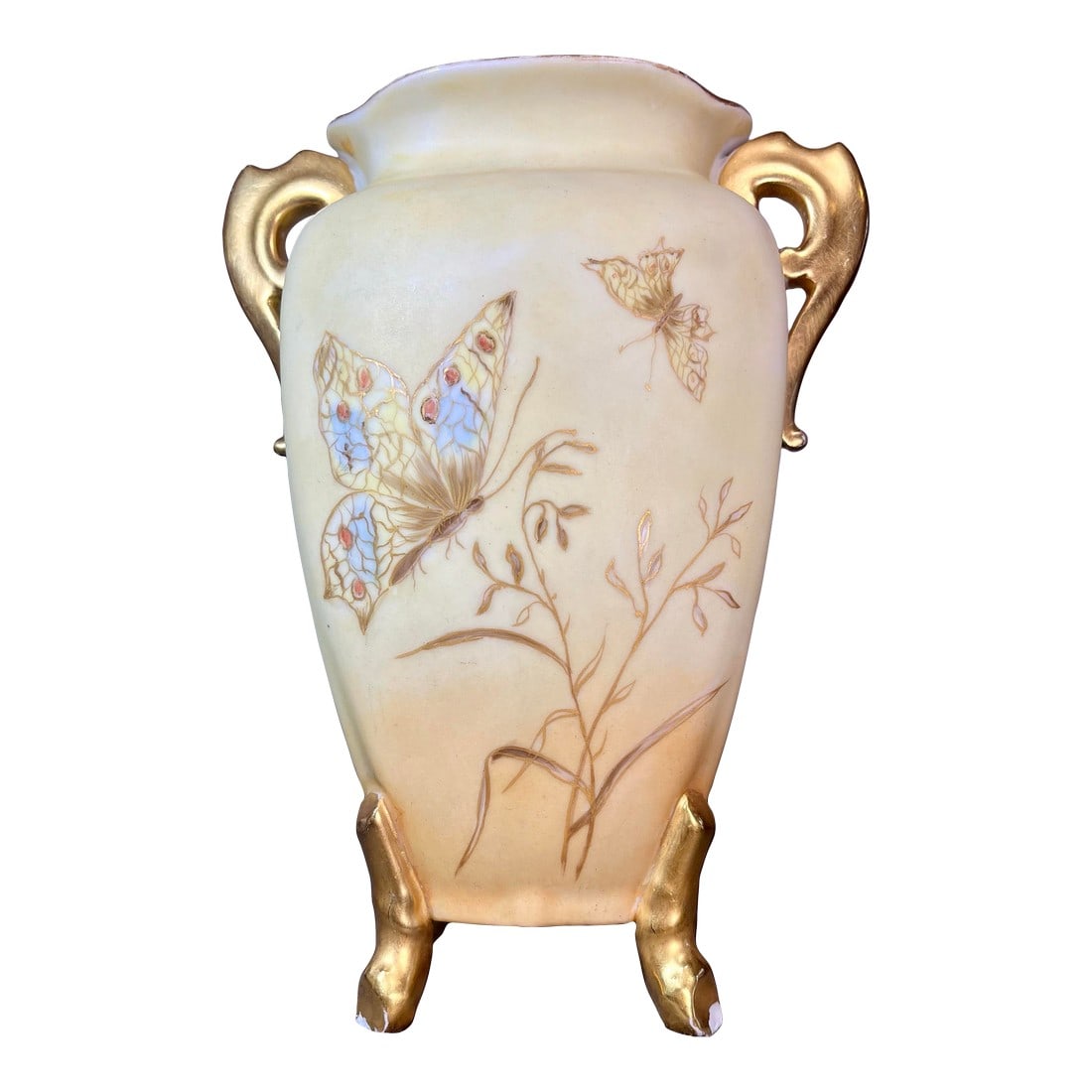 Antique Martial Redon Limoges Handled Footed Porcelain Vase: Cream & gold hand panted porcelain vase featuring dual handles and four little feet. Depicting images of florals and butterflies. Marked to underside. C. 1891-1906. Condition: Alterations: Original Co