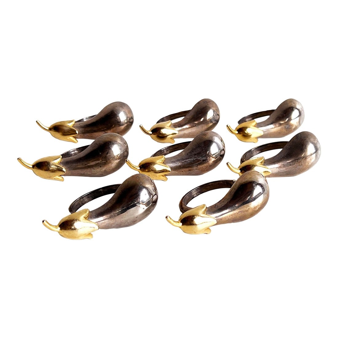 Vintage Eggplant Form Napkin Rings in Silver Plate & Gold Brass - Set of 8: Elevate your table setting with this elegant set of 8 eggplant napkin rings featuring sleek silver plated loops paired with the golden brass eggplant tops. Each ring has original patina and subtle var