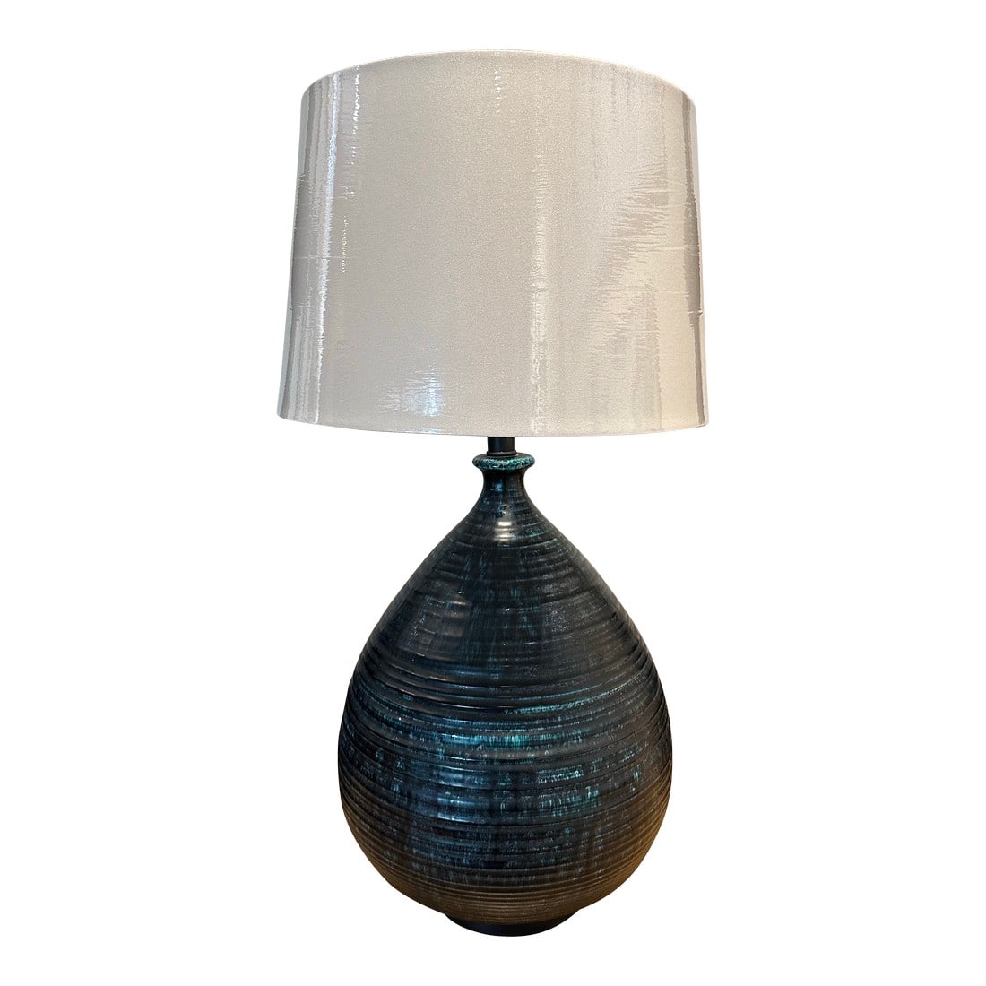 Vintage Glazed Ceramic Blue Lamp. Dip Glaze Hand Thrown Body. Deep Blues.: Absolute stunner. Generous in shape gorgeous color. Blue teal drip glaze over concentric ridges. Haut and huge with nod to exciting explorative design of earlier days. Made 1950-1960s. It is 29" tall
