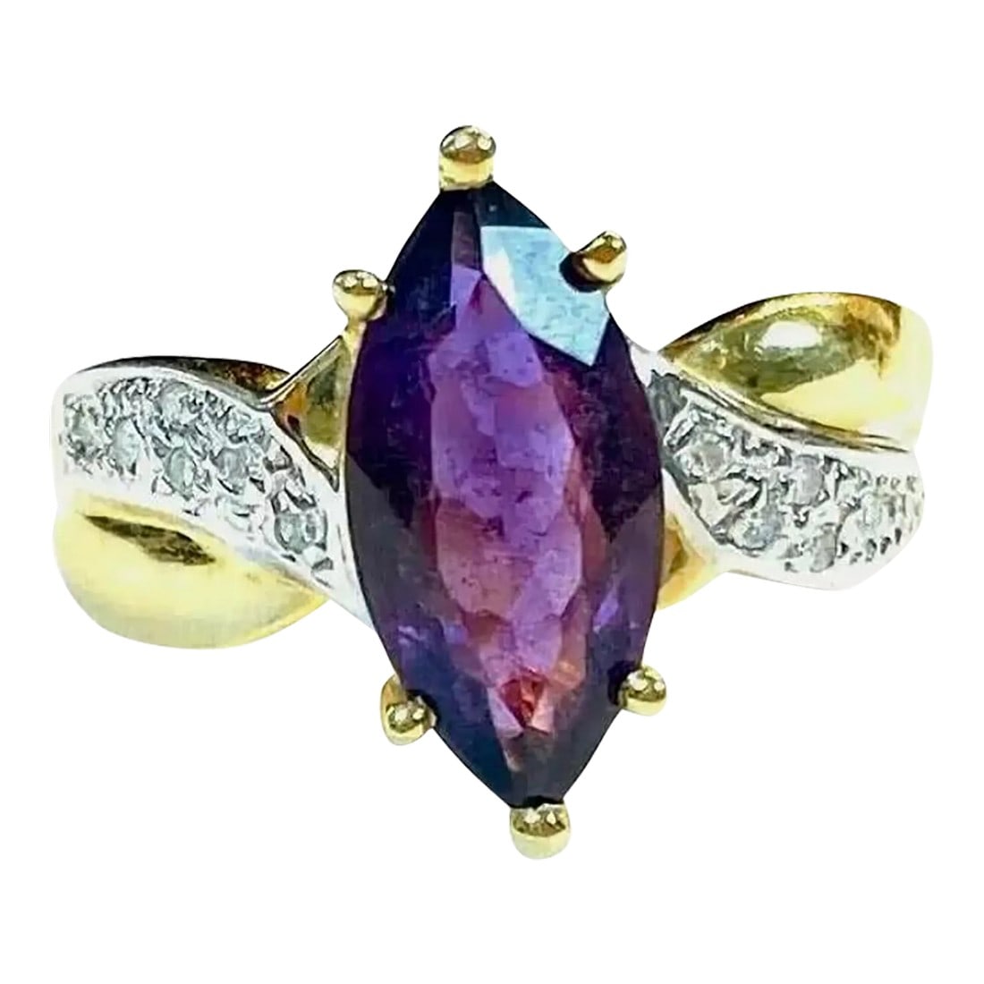 Amethyst and Diamond 14k Yellow Gold Ring: 14k yellow gold amethyst and diamond ring, 5.23 Grams TW. The dimensions of the marquise amethyst are approximately 12.6 mm by 7 mm. Approximately 2 carats. Marked 14k. Approximate size 7.5. Condition