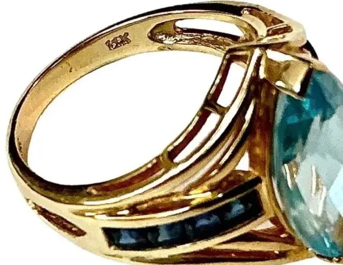 Light Blue Topaz With Dark Blue Topaz Baguettes 14k Yellow Gold Ring - 5