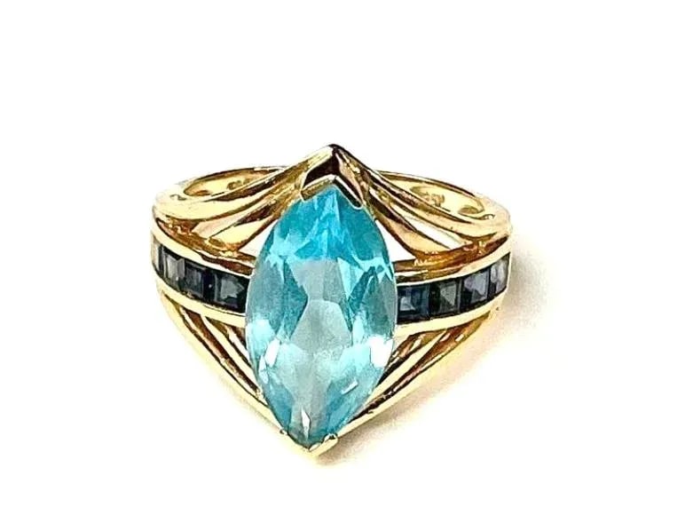 Light Blue Topaz With Dark Blue Topaz Baguettes 14k Yellow Gold Ring - 6