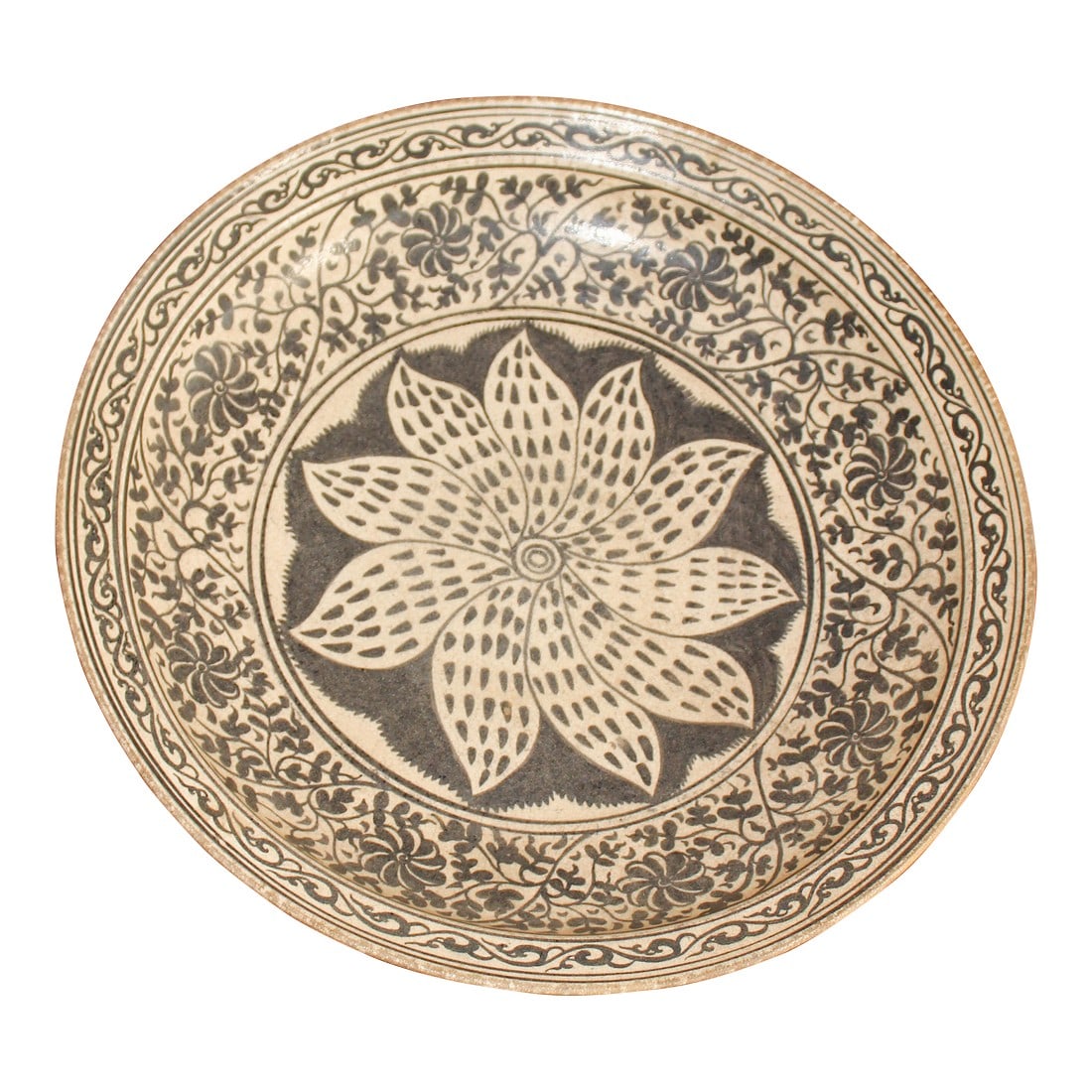 15th Century Northern Thailand Wang Kalong Kiln Ceramic Bowl With Iron Glaze: This elaborately decorated large 15th-century stoneware plate was produced in Wang Kalong kiln in Northern Thailand. The surface is prominently iron-glazed in taupe and black with a ten-petaled