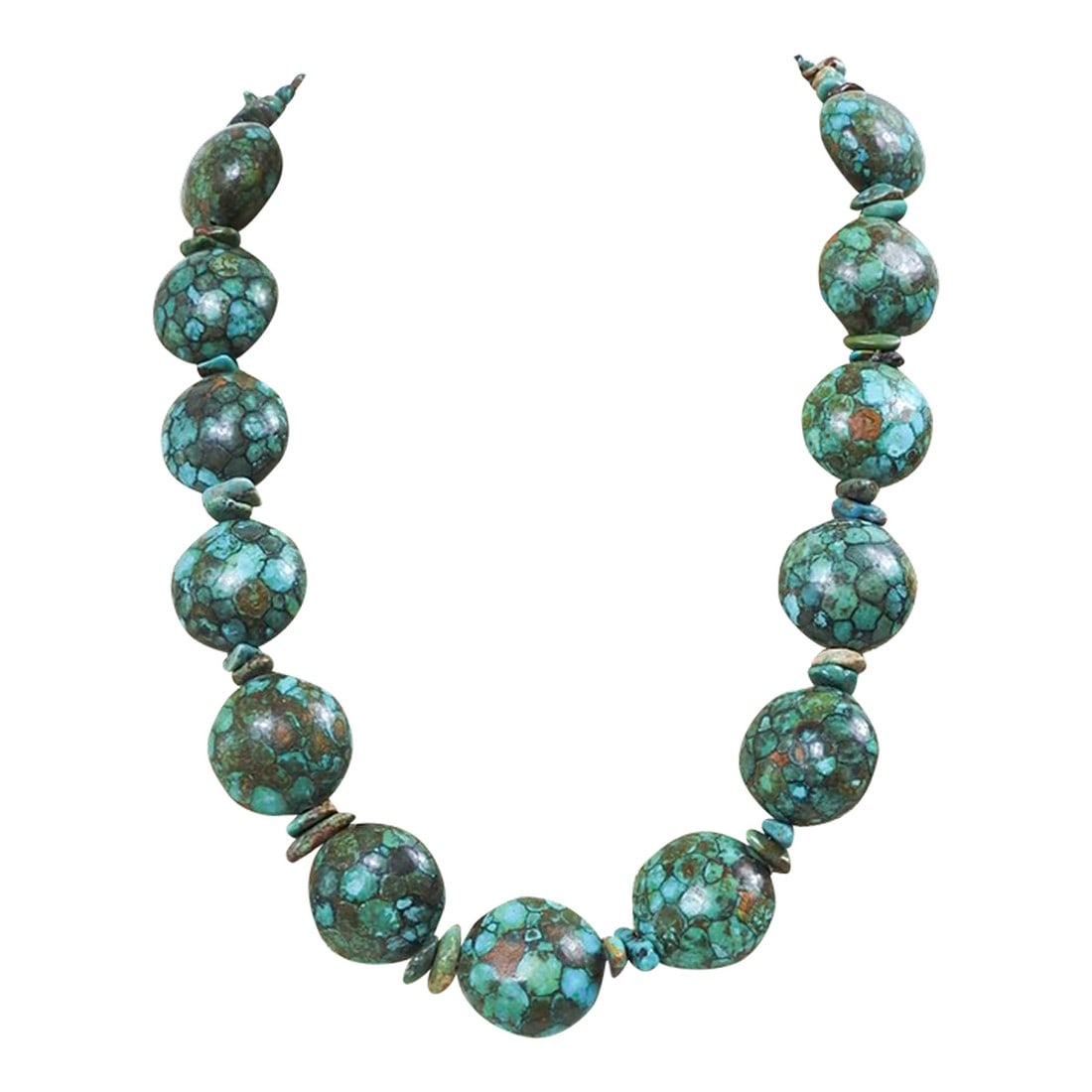 Late 20th Century Chunky Mosaic Turquoise Bead Necklace: Late 20th century chunky mosaic bead turquoise necklace. Each large bead is 1" dia. x .5" thick, puffy disc shape with small nuggets between and silvertone toggle closure. Condition: Alterations: