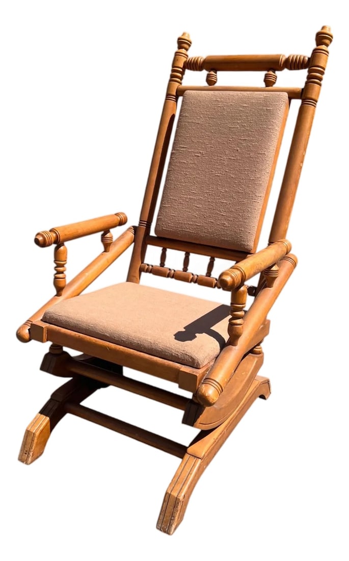 Mid-Century Early American New England Style Solid Maple Platform Rocker: This Mid-Century platform rocker is classic Early American New England style, crafted in solid maple with turned finials, spindle supports, and a honey-golden finish. Circa 1960s–70s, it combine