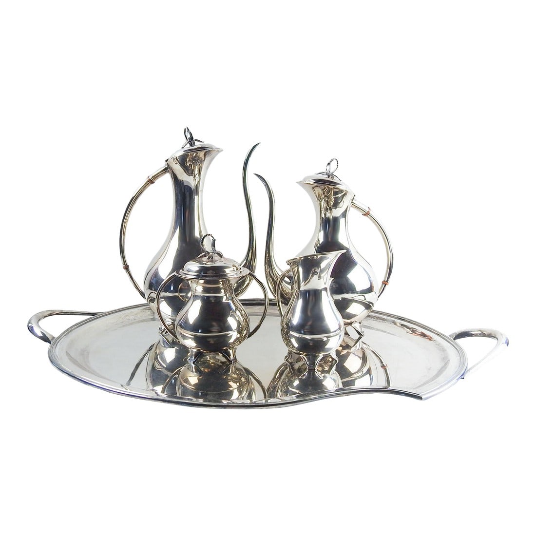 Mid 20th Century Eugen Ferner Tea and Coffee Silverplate Service - Set of 5: Mid 20th Century 5 piece silverplate tea and coffee set by Eugen Ferner (Germany) silver plate. Marked Eugen Ferner EPSN 1964. Tray 25.5"L x 17"W including handles, has a plexiglass protective insert.