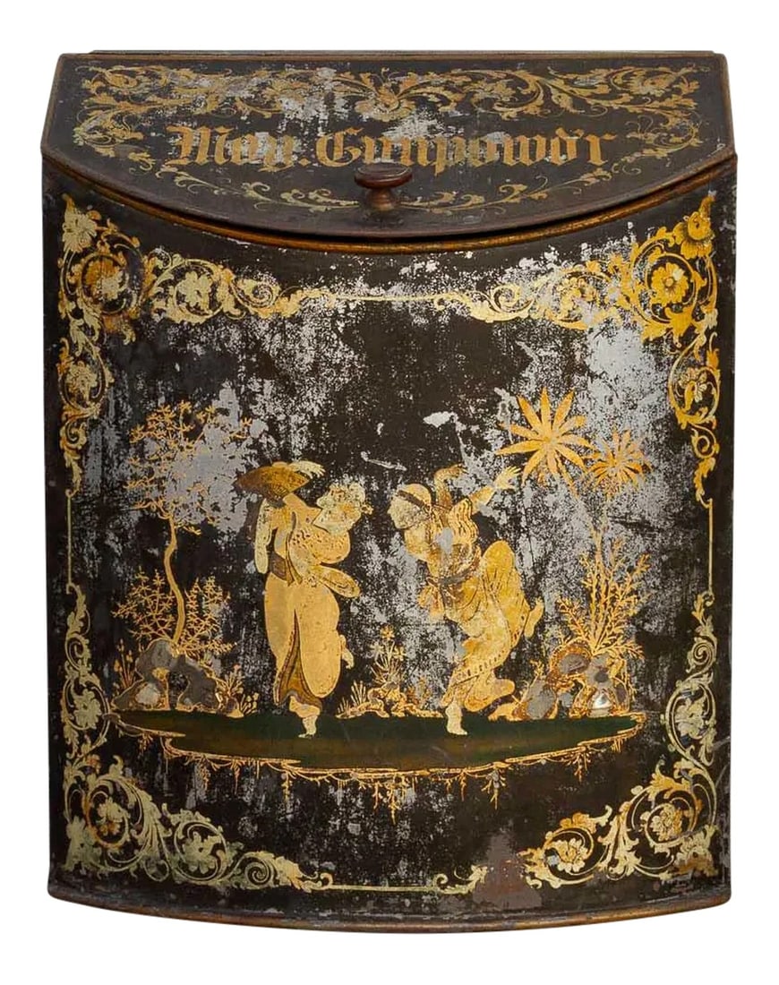 Antique Black & Gilt Chinoserie Drum Canister: A large tole canister drum from England that was originally used to store gunpowder. It features a black & gilt Chinoserie painted finish. This charming piece can be used as laundry basket or unique s