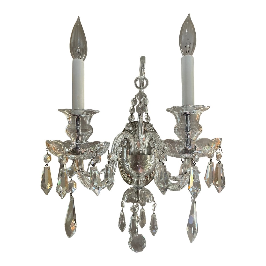 1980s Three Double Light Cut Crystals Sconces: Beautiful two light excellent proportioned all crystal sconces. Serpentine crystal arms, decorative crystal chains and crystal cups each with six bobeches. Three piece center stack with two tiers of c