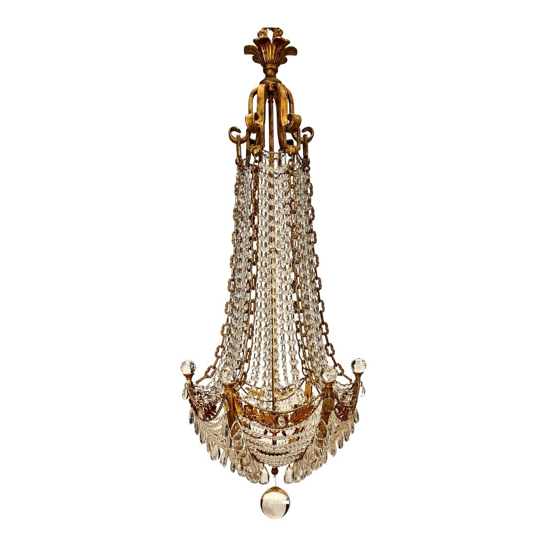 Mid 20th Century Hollywood Regency Gilt Metal & Crystal Beaded Basket Chandelier: A glamorous Hollywood Regency chandelier featuring a dramatic gilt metal frame and cascading strands of faceted crystal beads. The elongated basket silhouette creates a striking vertical presence, whi