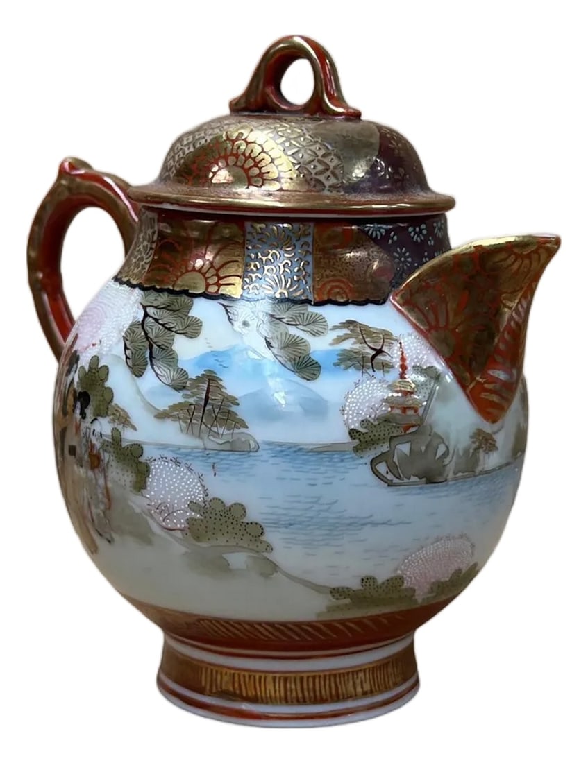 Oriental Orange Red Glaze Porcelain Art Display Teapot Scenery Graphic: This ornate Japanese Satsuma-style teapot features a classic globular body resting on a short, flared pedestal base, exuding an air of Meiji-era elegance. The vessel is intricately decorated with a
