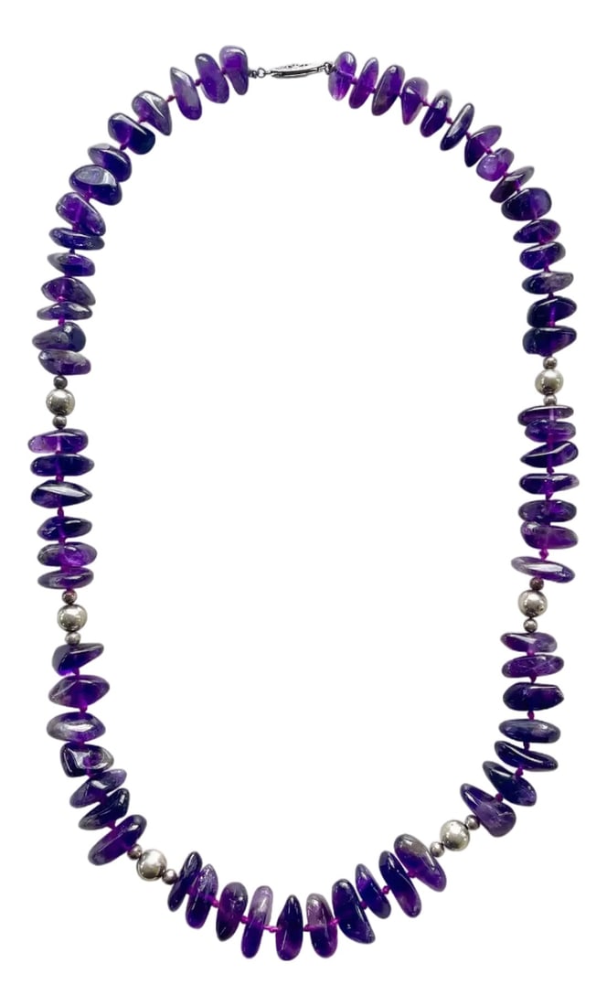 Amethyst and Sterling Silver Hand Knotted Beaded Necklace: Gorgeous quality vintage amethyst and sterling silver hand knotted beaded necklace from the 1980s. 22" long Condition: Alterations: Original Condition Unaltered Imperfections: Some Imperfections Condi