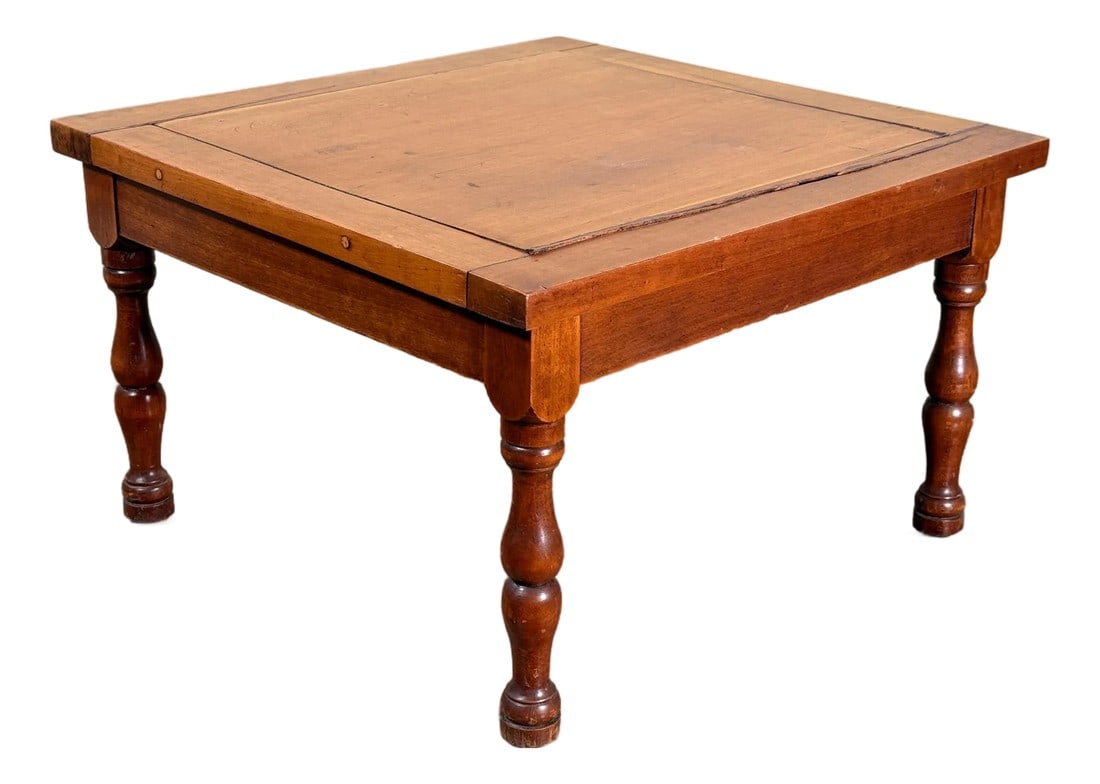 19th Century American Walnut Turned Leg Side Table: This late 19th century American side table is constructed in walnut with a square plank-style top set into a molded frame and supported by four turned legs joined with traditional mortise and tenon