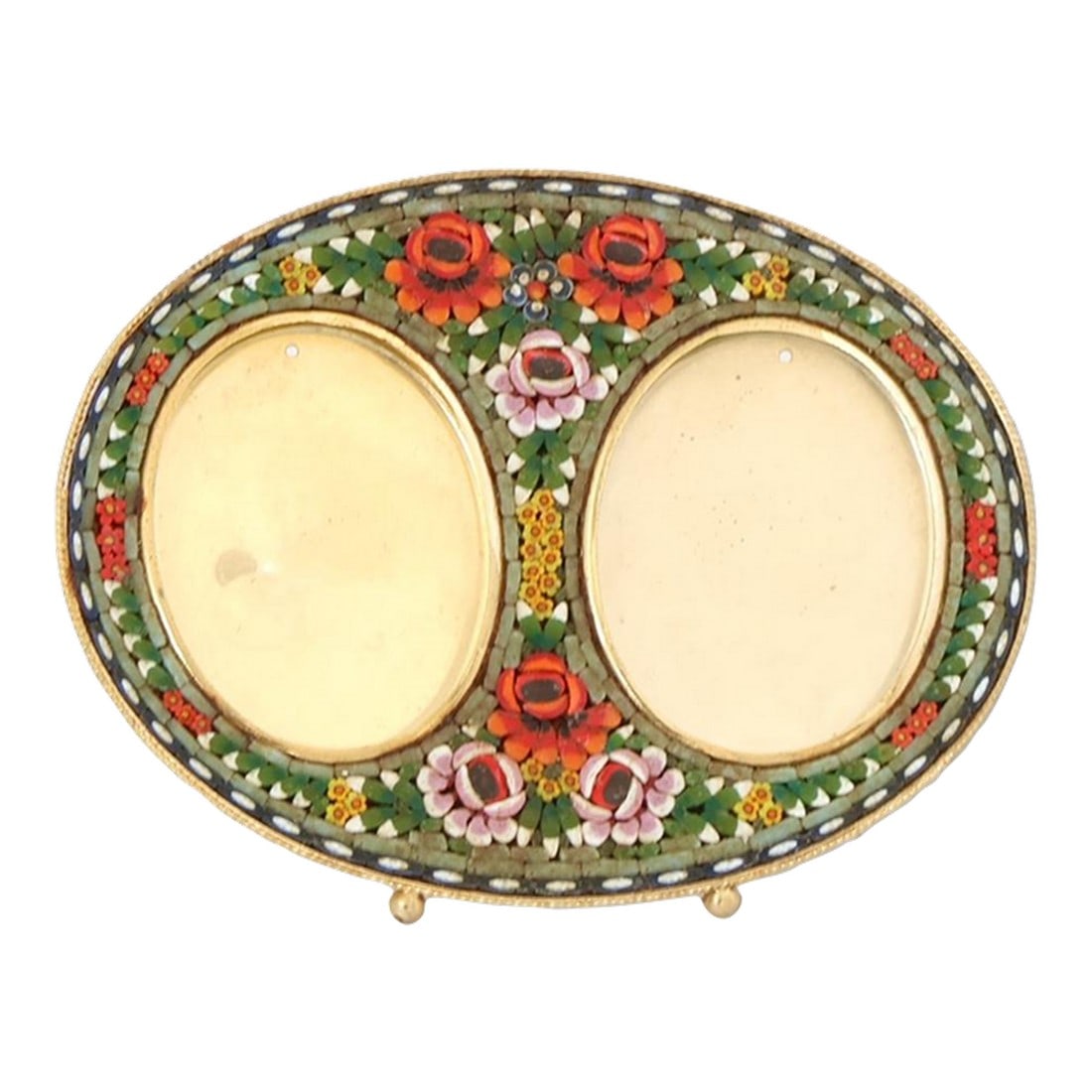 Midcentury Double Italian Micromosaic Frame: A luminous midcentury Italian micromosaic double frame, hand-set with thousands of tiny glass tesserae in rich emerald, ruby, blush, ivory, and gold tones. The oval twin apertures are framed by a