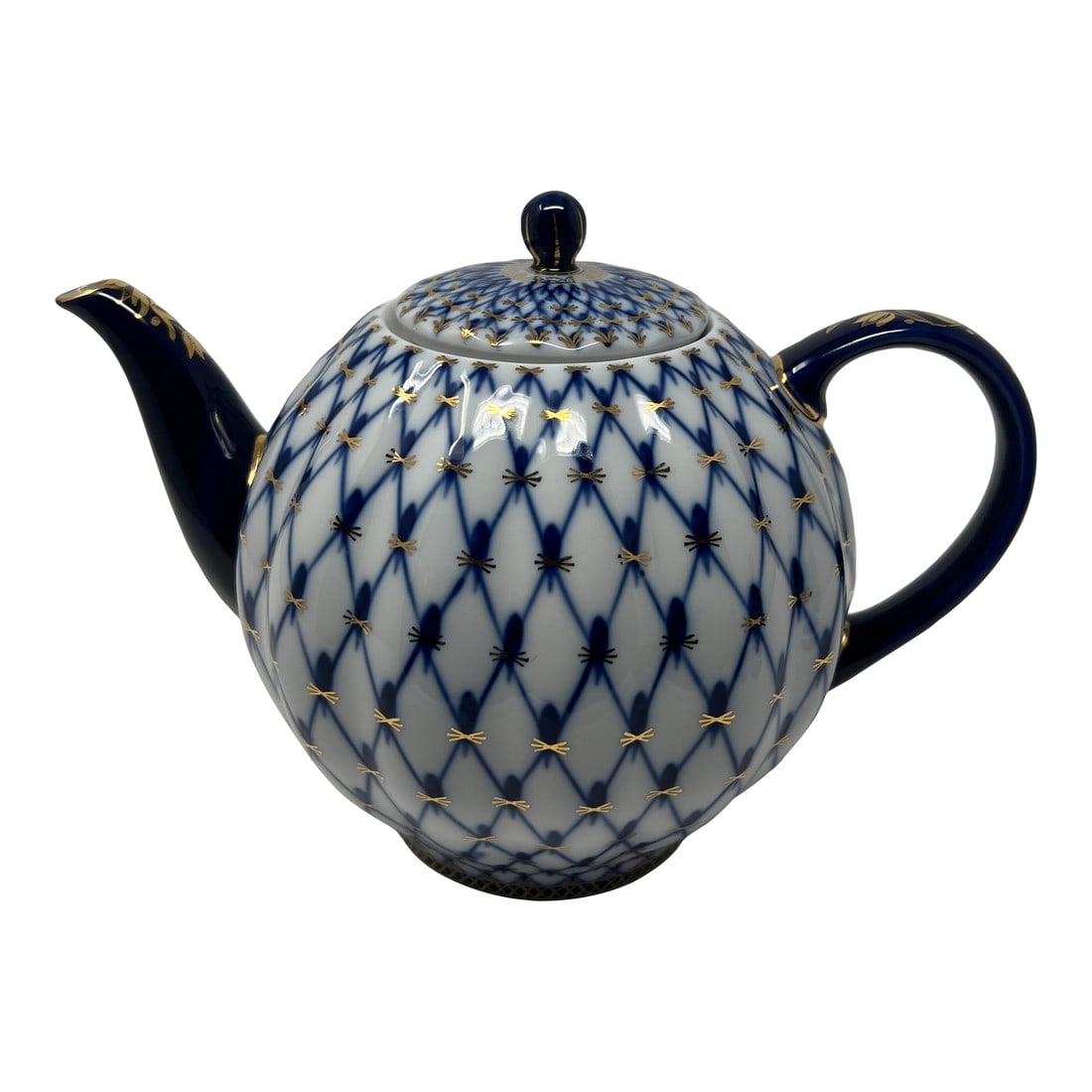 1970s Imperial Russian Cobalt Net Porcelain Teapot With Hand-Painted Gold: A timeless example of Russian porcelain artistry, this Imperial Porcelain Factory teapot features the iconic Cobalt Net pattern, meticulously hand-decorated in deep cobalt blue with hand-applied 24k g