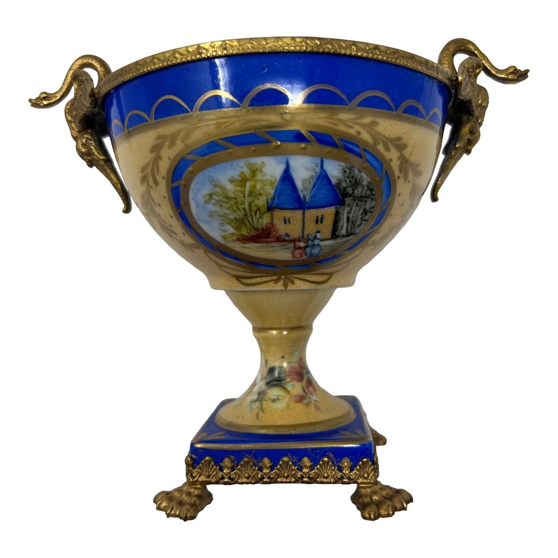 Mid 20th Century French Limoges Neoclassical Porcelain Urn With Gilt Bronze Swan Handles: A refined mid-century French Limoges porcelain urn, hand-painted and executed in the neoclassical / Empire revival tradition. Finished in a rich cobalt blue ground with extensive gilt detailing, the u