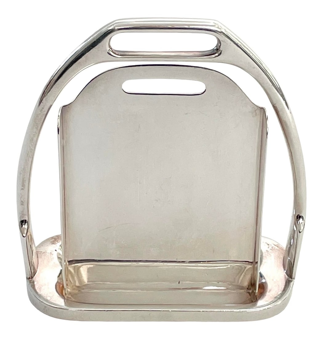 Hermès Paris Stirrup Form Frame or Card Holder Accessory: In the shape of a stirrup, this frame or card holder was made by Hermès in the 1970s. It is stamped "Hermès Paris Made in France". Condition: Alterations: Original Condition Unaltered